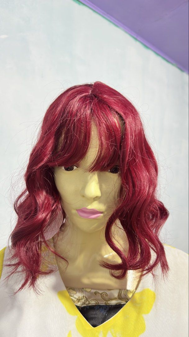 Red Wavy Wig with Bangs (Category: Hair Accessories) located in Angeles City. Submitted by clmsnw01 (Listing ID 1431966051, Image 2). Description: - Red, wavy wig - Features bangs - Short style - Styled on a mannequin - Ready to wear - Transforms your look instantly.