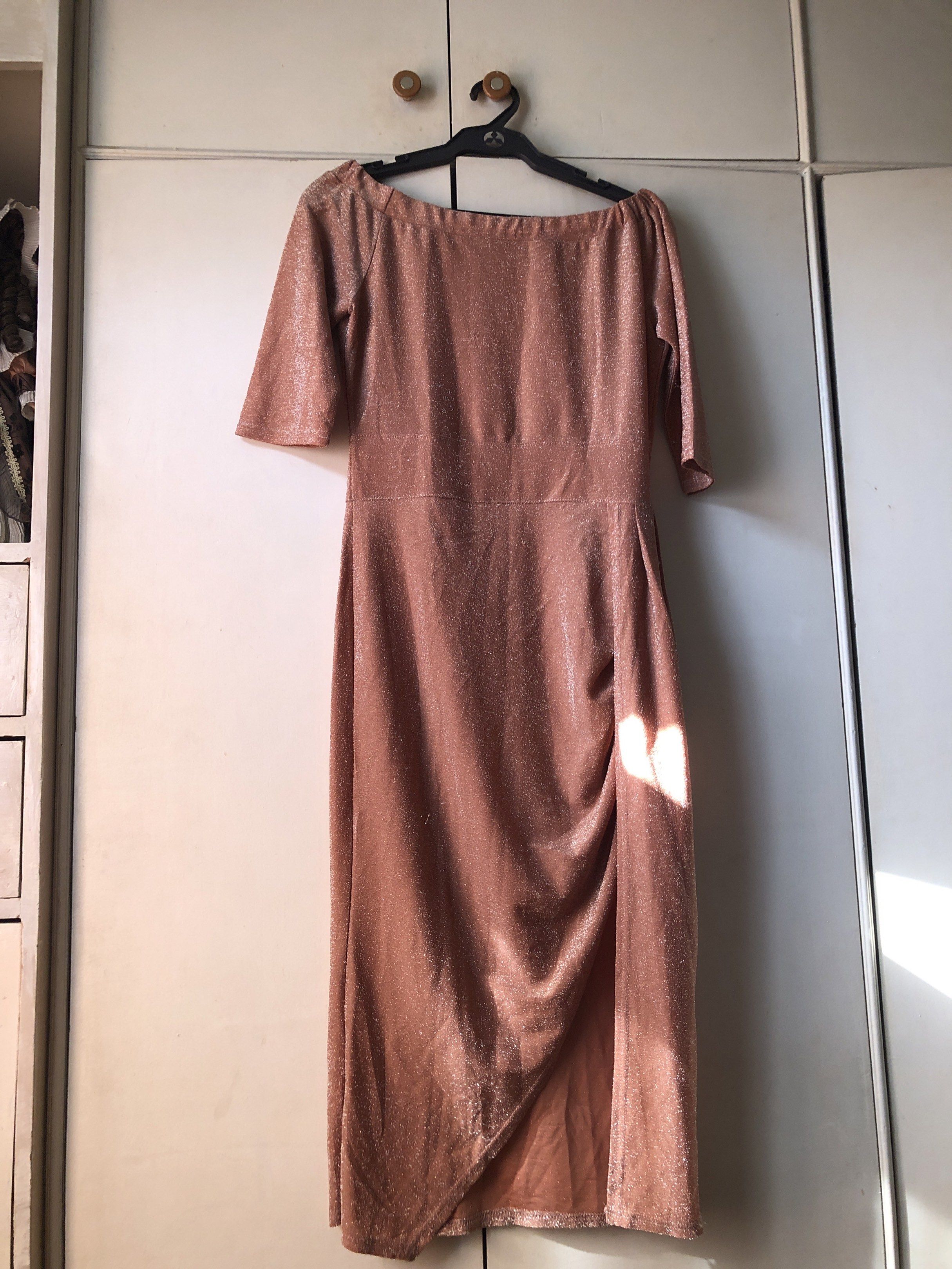 Rose Gold Midi Dress (Category: Dresses) located in Paranaque City. Submitted by commandercinnabutt (Listing ID 1431873556, Image 1). Description: - Rose gold midi dress - Off-shoulder neckline - Short sleeves - Fitted bodice - Side drape detail - Subtle shimmer - Perfect for special occasions.