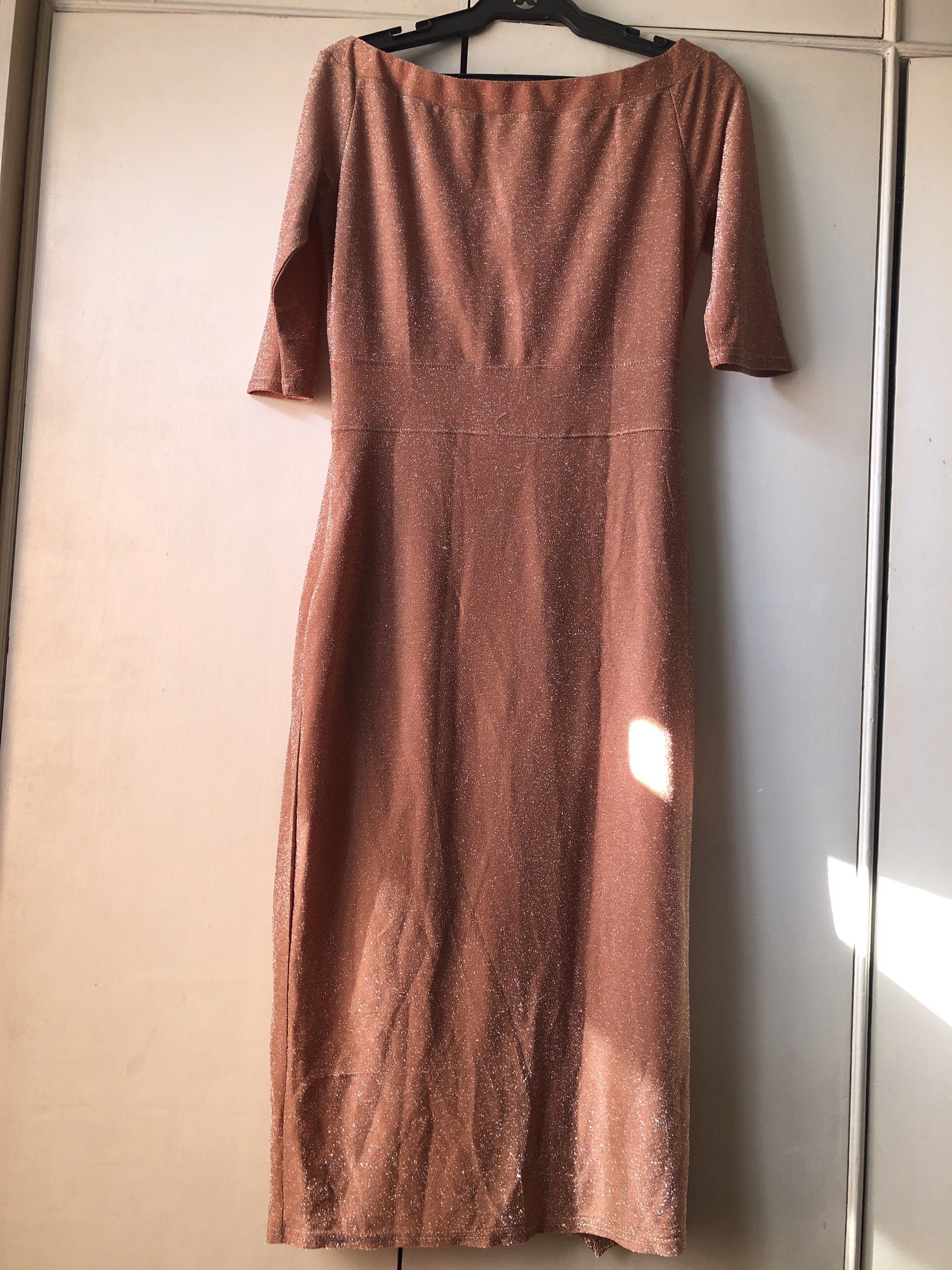 Rose Gold Midi Dress (Category: Dresses) located in Paranaque City. Submitted by commandercinnabutt (Listing ID 1431873556, Image 2). Description: - Rose gold midi dress - Off-shoulder neckline - Short sleeves - Fitted bodice - Side drape detail - Subtle shimmer - Perfect for special occasions.