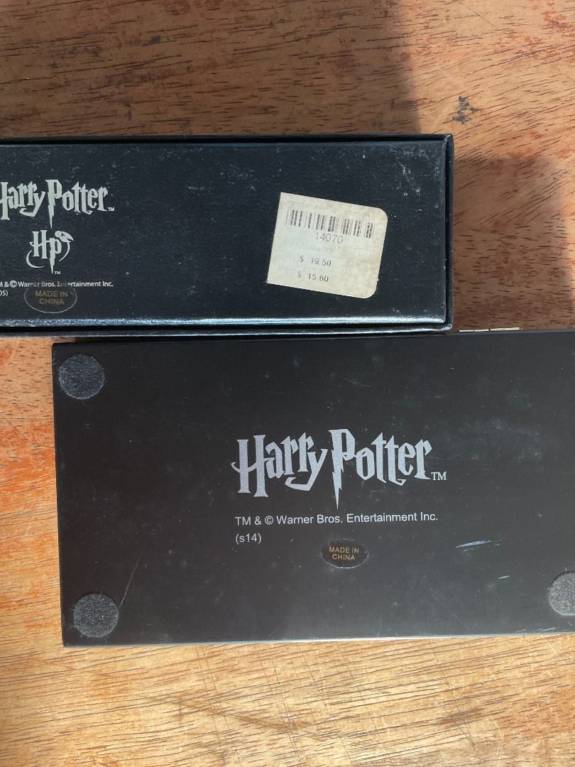 [RUSH SALE] Bundle: Harry Potter Pen and Bookmark Set (Category: Storybooks) located in Antipolo. Submitted by syd.badiola (Listing ID 1431881648, Image 2). Description: - Harry Potter Slytherin pen (bought for 15USD). Ink doesnt wornk anymore BUT IS REPLACEABLE - Bookmarks featuring the Hufflepuff and Ravenclaw house crests. - Both from Warner Brothers California - All items never used RFS: Moving.
