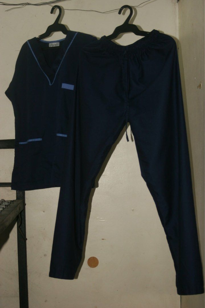 Scrub suit (Category: Others Tops) located in Manila. Submitted by yan.declutter (Listing ID 1431967769, Image 1). Description: - Cotton Fit - Color: Purple - Original price: ₱450 -Used only a few times in 1 month.