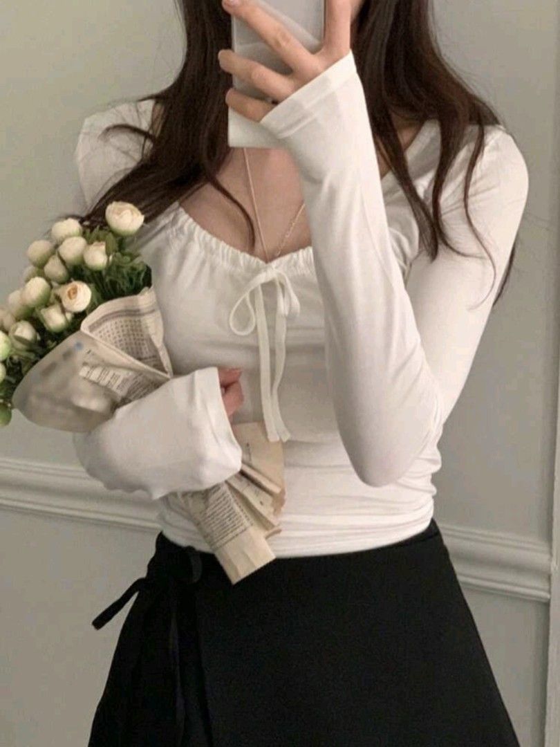 SMALL White Long Sleeve Top with Tie (Category: Blouses) located in Caloocan City. Submitted by saramedeclutter (Listing ID 1431799816, Image 2). Description: - White long-sleeved top - Scoop neckline with tie detail - Smooth, stretchy fabric - Versatile for layering or wearing alone - Long, fitted sleeves fits XS-S .