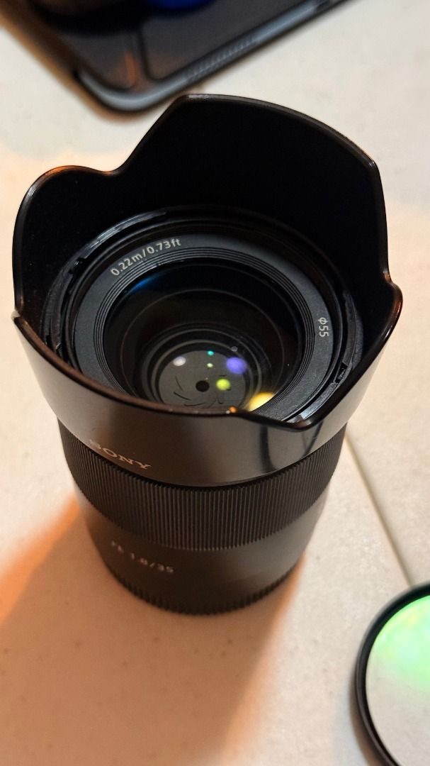 Sony FE 35mm f/1.8 Lens (Category: Lens & Kits) located in Las Pinas. Submitted by iavntcreate (Listing ID 1431895987, Image 1). Description: - Sony FE 35mm f/1.8 lens - 55mm filter thread - Includes lens hood - Minimum focusing distance: 0.22m / 0.73ft - Black finish - Lens cap and hood included (as shown in photos) - Bought 2nd hand and used for 1 project only - comes with box Rush price. 15k if taken today RFS: Extra Lens.