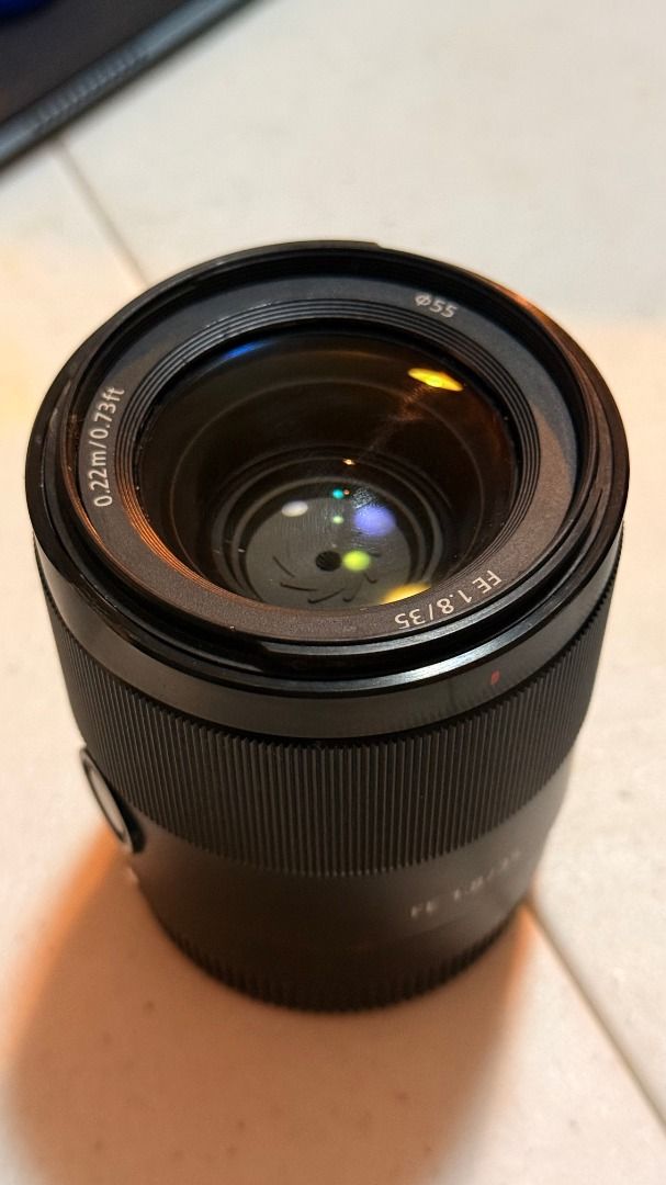 Sony FE 35mm f/1.8 Lens (Category: Lens & Kits) located in Las Pinas. Submitted by iavntcreate (Listing ID 1431895987, Image 2). Description: - Sony FE 35mm f/1.8 lens - 55mm filter thread - Includes lens hood - Minimum focusing distance: 0.22m / 0.73ft - Black finish - Lens cap and hood included (as shown in photos) - Bought 2nd hand and used for 1 project only - comes with box Rush price. 15k if taken today RFS: Extra Lens.