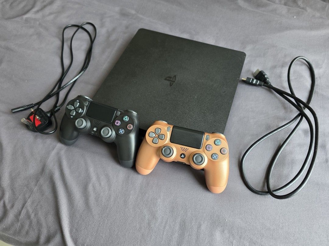 Sony PlayStation 4 slim Console with 2 Controllers (Category: PlayStation) located in Kuala Lumpur. Submitted by wildforest-69f5 (Listing ID 1431850700, Image 2). Description: -PS4 Slim 1TB - Comes with 2 controllers (orange and black) no stick drift - HDMI cable included - Power cable included - Console works fine, no issues at all - PSN works can negotiate price.