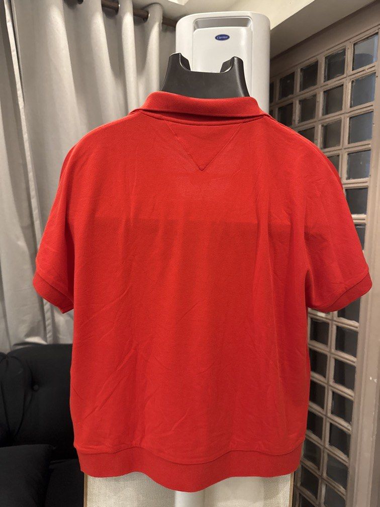 Tommy Hilfiger Polo / Tee (Overrun, XL) (Category: Formal Shirts) located in Pasig City. Submitted by drea3600 (Listing ID 1431948218, Image 3). Description: • Brand: Tommy Hilfiger • Design: Classic Hilfiger style with logo detailing • Color: [Red] • Size: [XL] • Material: 100% Cotton – soft & breathable • Origin: Overrun stock (factory surplus) Condition: Brand new, never used • Fit: Men’s shirt (unisex – women can wear oversized for chic look)
