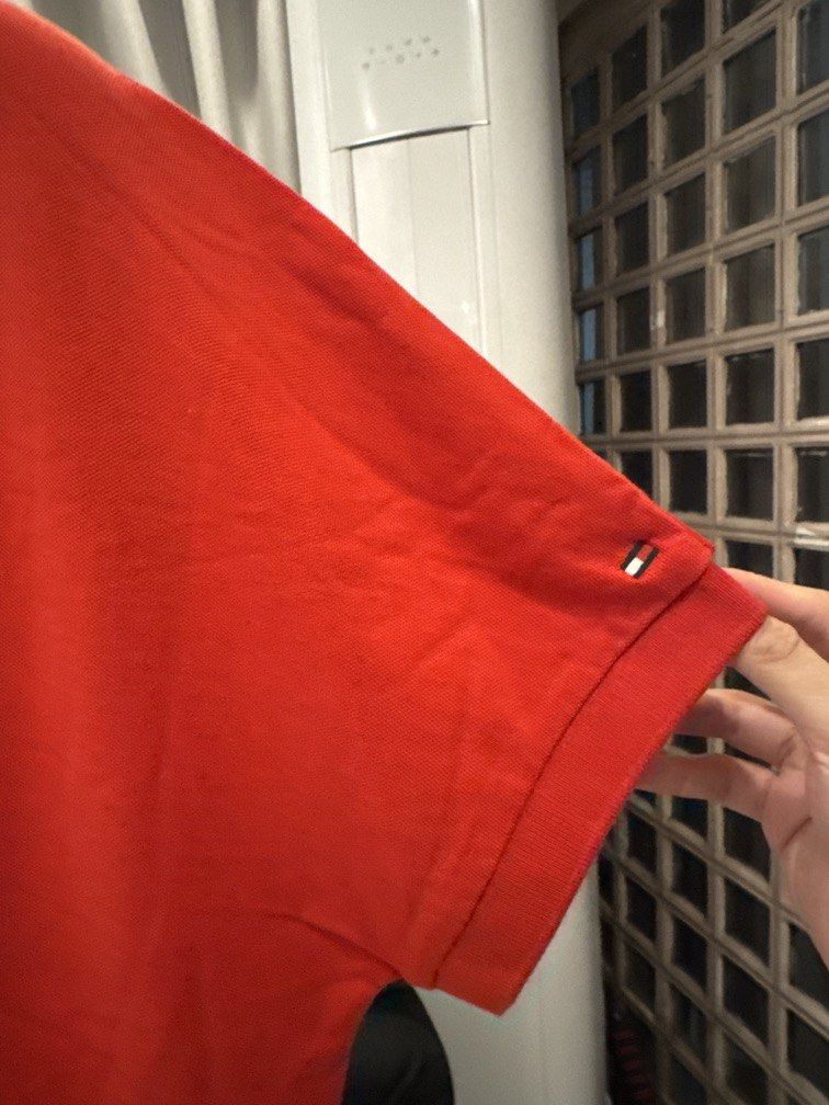 Tommy Hilfiger Polo / Tee (Overrun, XL) (Category: Formal Shirts) located in Pasig City. Submitted by drea3600 (Listing ID 1431948218, Image 2). Description: • Brand: Tommy Hilfiger • Design: Classic Hilfiger style with logo detailing • Color: [Red] • Size: [XL] • Material: 100% Cotton – soft & breathable • Origin: Overrun stock (factory surplus) Condition: Brand new, never used • Fit: Men’s shirt (unisex – women can wear oversized for chic look)