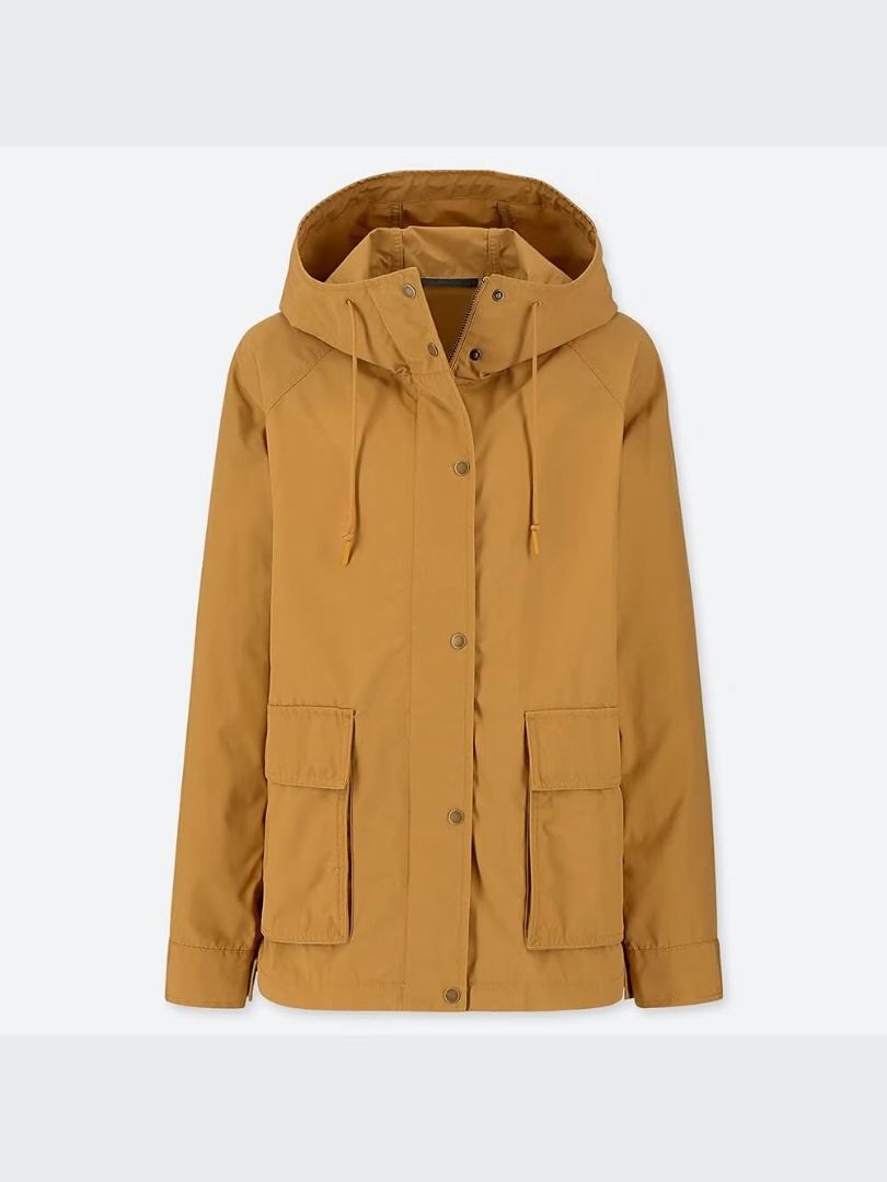 Uniqlo Parka / Raincoat - XL (Category: Coats, Jackets and Outerwear) located in Pasig City. Submitted by babypisces (Listing ID 1431928901, Image 2). Description: Uniqlo Hooded Raincoat Parka / Jacket in size XL Color hard to photograph. It is yellow-ish, looks like turmeric / a little khaki-like Water-repellent and windproof Zip and snap closure at front (4) Outer pockets Adjustable at waist / hips, hidden drawstring inside the hem Bought in Un