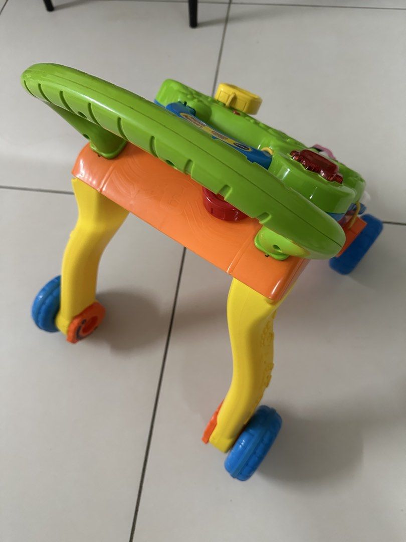 VTech Learning Walker (Category: Infant Playtime) located in Cyberjaya. Submitted by islurpcake (Listing ID 1431954550, Image 2). Description: - VTech Learning Walker for babies. - Designed to help babies learn to walk. - Features interactive buttons, lights, and sounds. - Includes numbers, music, and animal sounds. - Easy-to-push handle. - Colorful and engaging design. -missing PHONE.