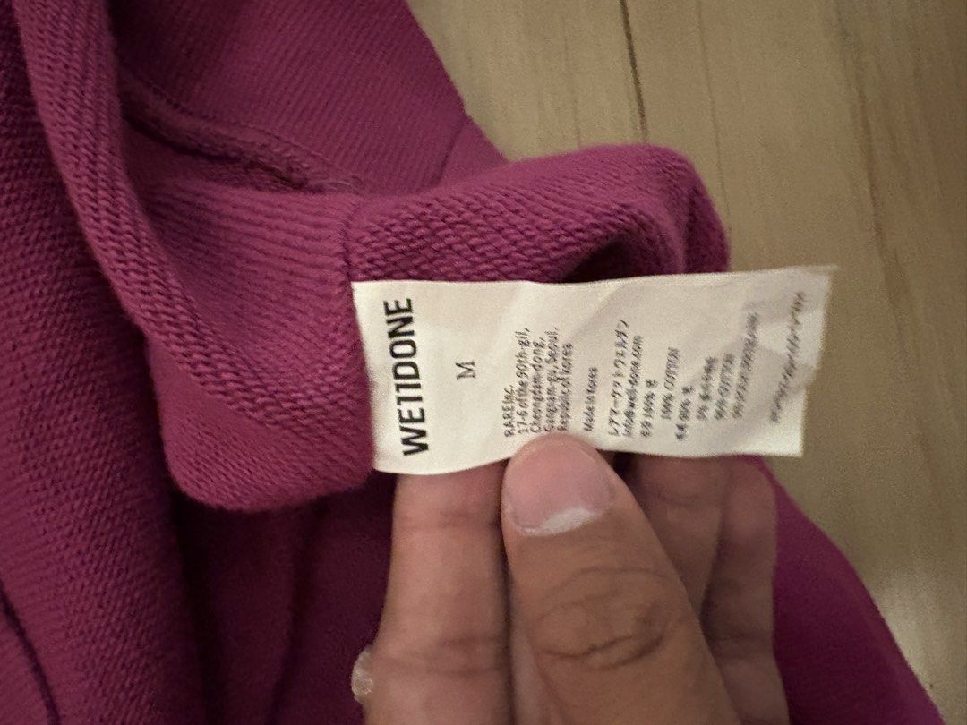 We11done Logo Sweatshirt - Magenta (Category: Coats, Jackets and Outerwear) located in Manila. Submitted by jlogup08 (Listing ID 1431978090, Image 3). Description: - Authentic We11done sweatshirt - Vibrant magenta color - Size: XL best fit - Features brand logo on front - Brand name detail on sleeve - Crew neck design - Made in Korea - Material: 99% cotton, 1% polyurethane.