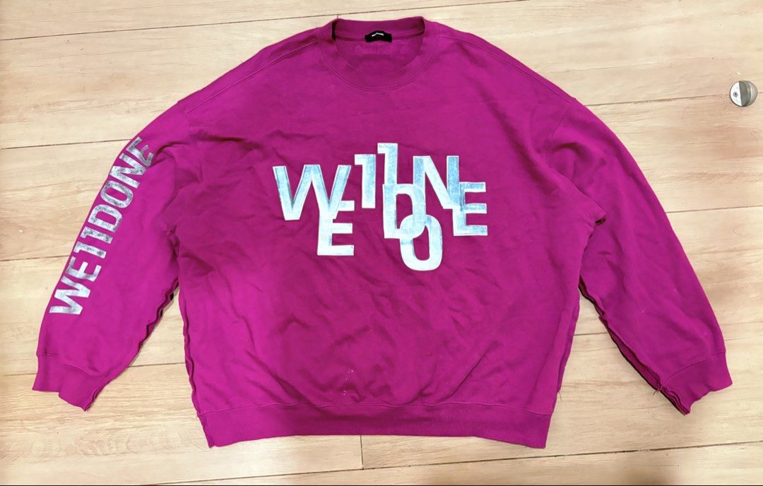 We11done Logo Sweatshirt - Magenta (Category: Coats, Jackets and Outerwear) located in Manila. Submitted by jlogup08 (Listing ID 1431978090, Image 1). Description: - Authentic We11done sweatshirt - Vibrant magenta color - Size: XL best fit - Features brand logo on front - Brand name detail on sleeve - Crew neck design - Made in Korea - Material: 99% cotton, 1% polyurethane.