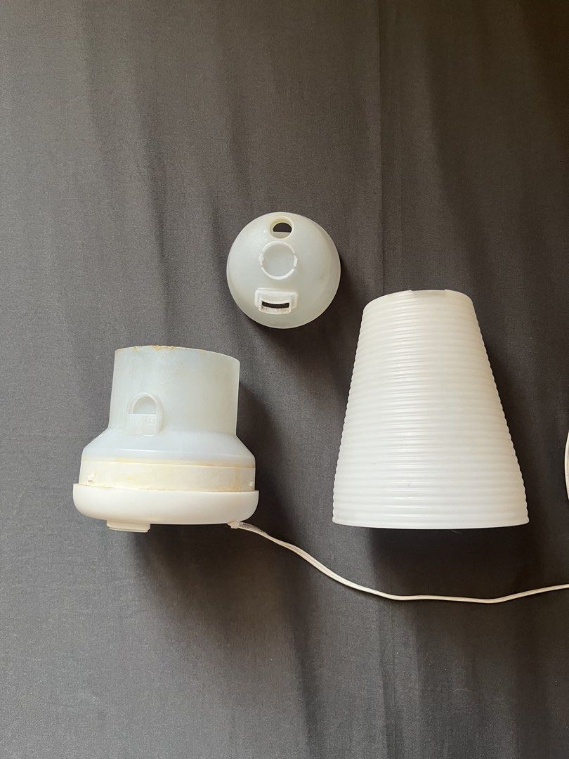 White Aroma Diffuser Cylinder Humidifier (Category: Air Purifiers & Dehumidifiers) located in Cavite. Submitted by mr.jbe (Listing ID 1431913586, Image 3). Description: Condition: 8.0/10.0 (Comes with free essential oils, With heavy signs of usage, no issues on functionality) - Free 2 essential oils - White aroma diffuser with a stylish ribbed design. - Includes a power adapter for immediate use. - Features convenient light and mist control butto