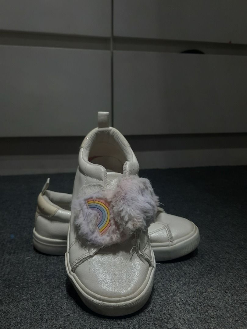 White Sneakers with Rainbow Detail - PRIMARK (Category: Babies & Kids Fashion) located in Batangas. Submitted by kalachuchiie (Listing ID 1431892989, Image 1). Description: - Primark (AW22) - White slip-on sneakers - Features a fluffy rainbow detail - Made of shiny material - White soles - UK10, EUR28 📍 Meet up: Batangas City 📦 Shipping available: LBC / JRS / J&T 💳 Payment first via GCash 📩 Message me if interested/sure buyer only 😊.