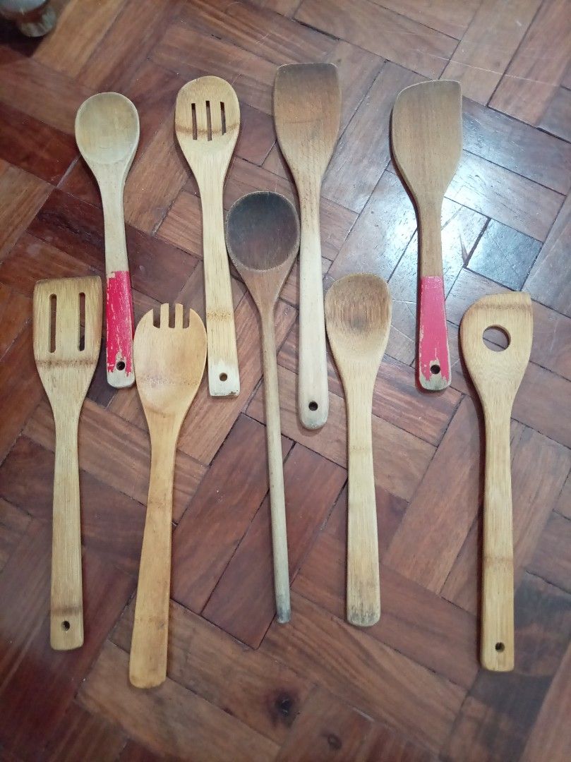 Wooden Kitchen Utensils Set (Category: Dinnerware & Cutlery) located in Makati City. Submitted by giovandbertha1 (Listing ID 1431927012, Image 1). Description: - Wooden kitchen utensil set - Includes various spoons and spatulas - Different shapes and sizes for cooking - Some utensils have hanging holes - Made of wood.