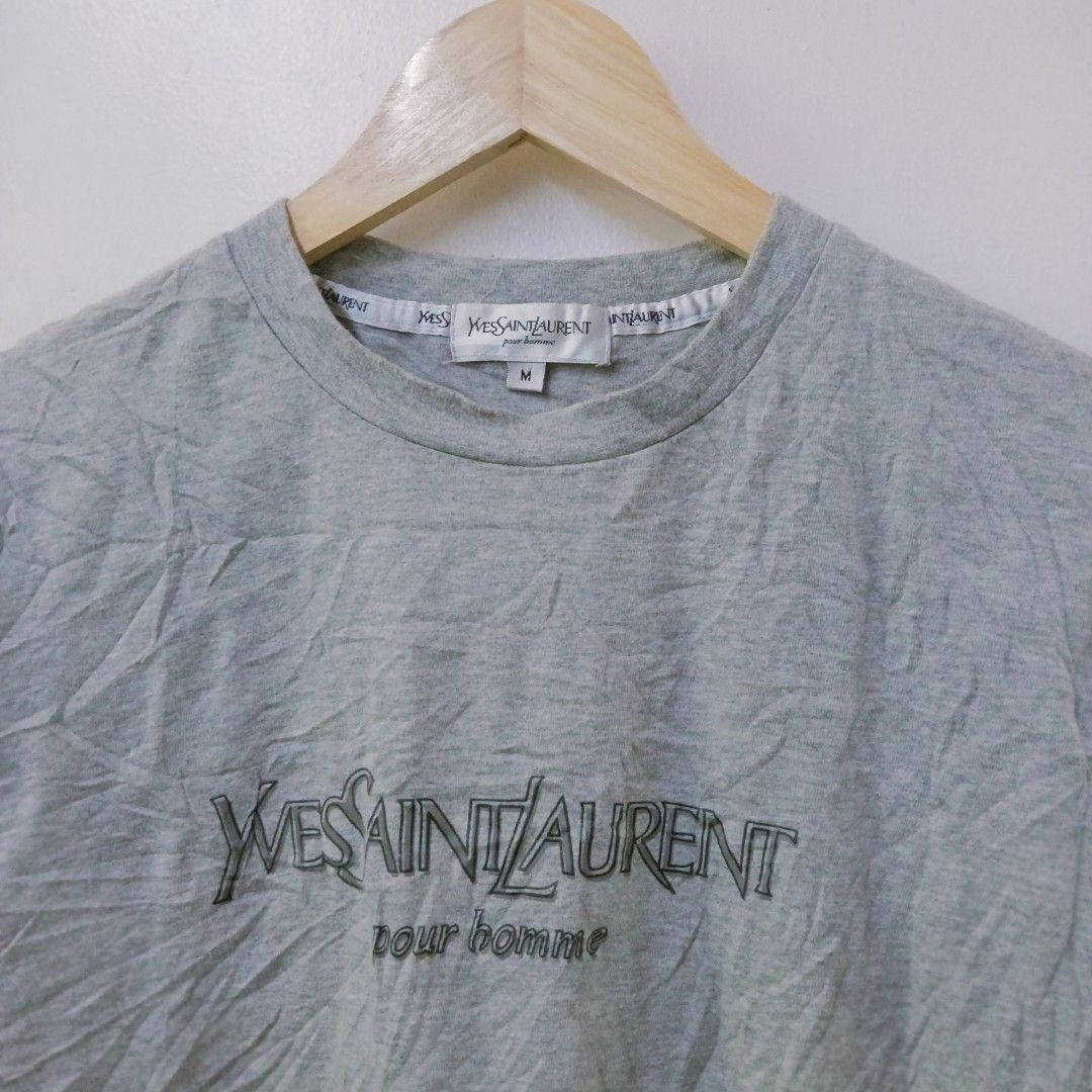 YSL vintage pour Homme script design tshirt (Category: Luxury Apparel) located in Cebu City. Submitted by bsidethrift (Listing ID 1431928597, Image 2). Description: orig 💯 Medium 20 pit to pit 27 length excellent condition.
