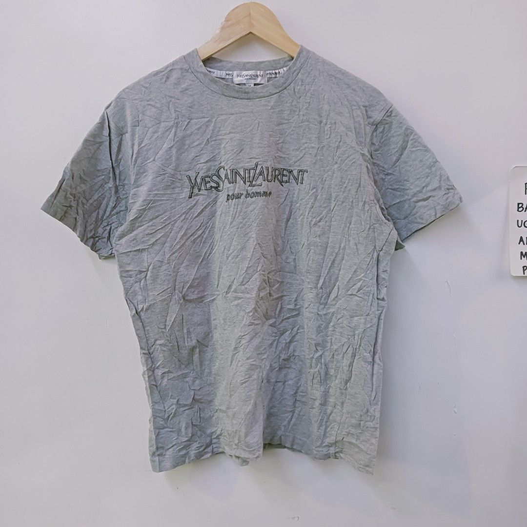 YSL vintage pour Homme script design tshirt (Category: Luxury Apparel) located in Cebu City. Submitted by bsidethrift (Listing ID 1431928597, Image 1). Description: orig 💯 Medium 20 pit to pit 27 length excellent condition.