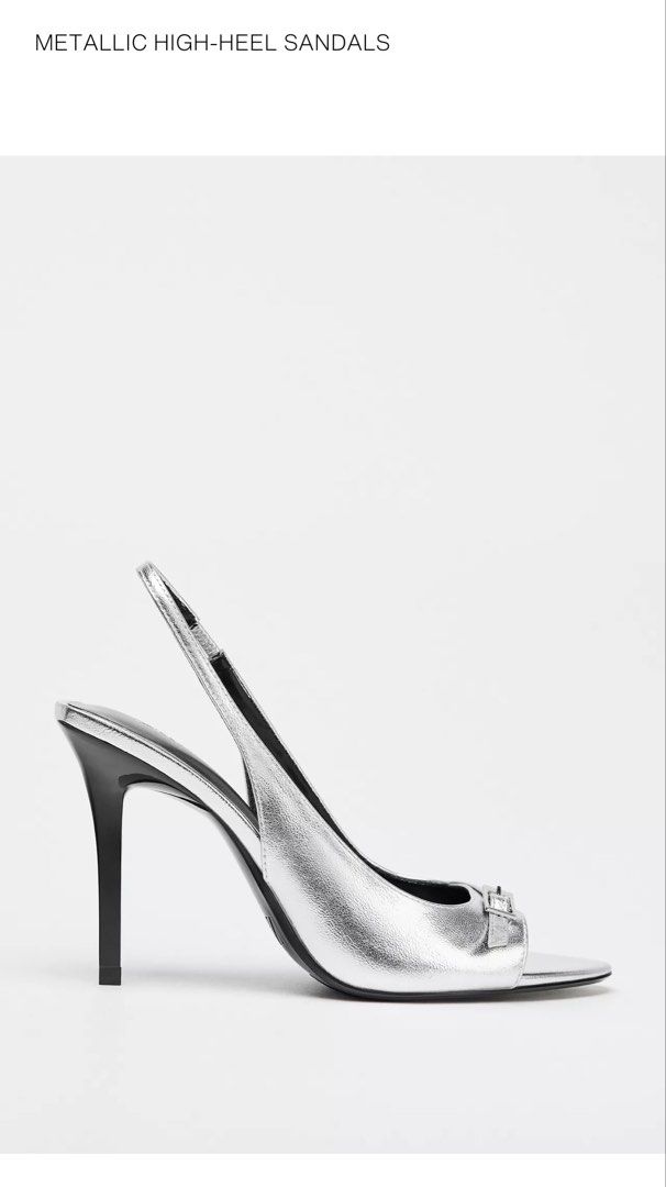 Zara Metallic High-Heel Slingback Sandals (Category: Heels) located in Las Pinas. Submitted by masterjac (Listing ID 1431822641, Image 1). Description: - Zara silver metallic slingback sandals - Buckle detail on front strap - Black stiletto heel - Slingback strap for support - Black soles - Unworn.