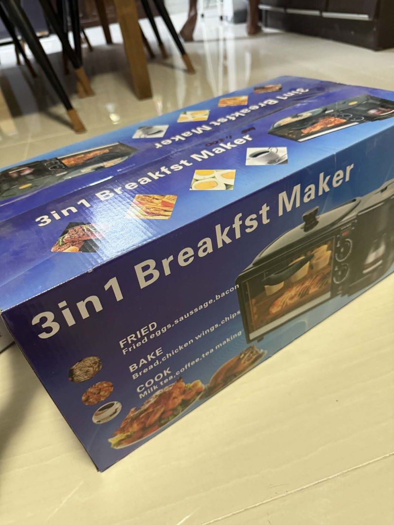 3-in-1 Breakfast Maker (Category: Coffee Machines & Makers) located in Quezon City. Submitted by happystar_f40583 (Listing ID 1432050387, Image 1). Description: - 3-in-1 Functionality: Fry, Bake, and Brew - Cook eggs, sausage, bacon - Bake bread, chicken wings, chips - Brew milk tea and coffee - Prepare a complete breakfast with one appliance.