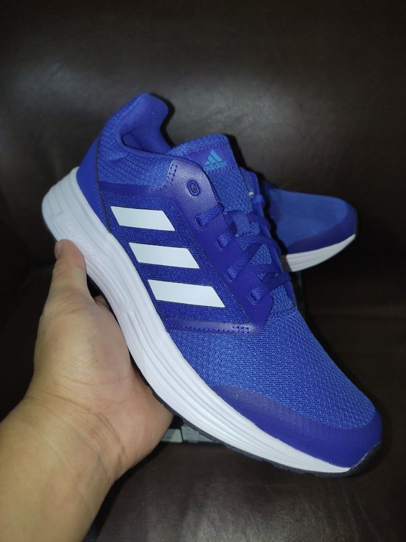 Adidas Galaxy 5 Running Shoes - Blue (Category: Sneakers) located in Balanga. Submitted by superbhetz1 (Listing ID 1432196219, Image 2). Description: - Adidas Galaxy 5 running shoes - Color: Blue - Size: US 9, UK 8 1/2, EUR 42 2/3 - Model: FY6736 - Original Price: PHP 2,000 - Includes original box.