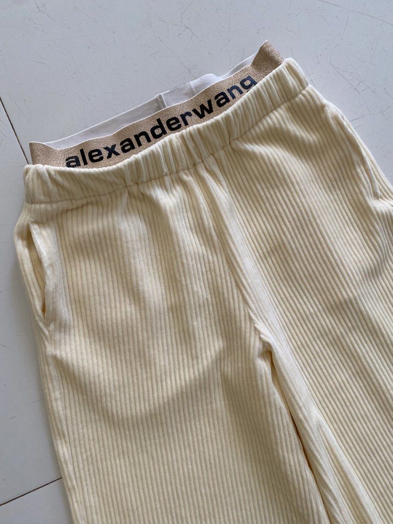Alexander Wang Corduroy Wide Leg Pants (Category: Other Bottoms) located in Binmaley. Submitted by maryjeyn (Listing ID 1432057461, Image 2). Description: - Alexander Wang cream corduroy wide-leg pants - Wide-leg style - Elastic waistband with Alexander Wang logo - Two front pockets - Back pocket with "wang" logo - Made of 100% cotton.