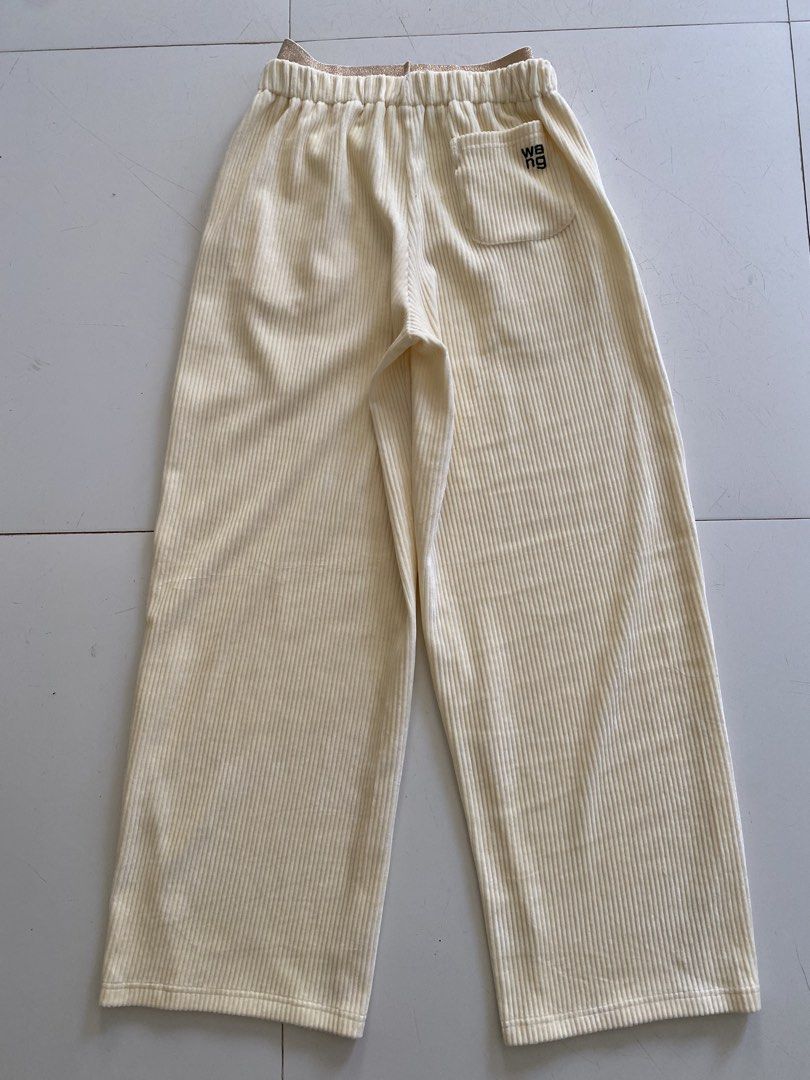 Alexander Wang Corduroy Wide Leg Pants (Category: Other Bottoms) located in Binmaley. Submitted by maryjeyn (Listing ID 1432057461, Image 3). Description: - Alexander Wang cream corduroy wide-leg pants - Wide-leg style - Elastic waistband with Alexander Wang logo - Two front pockets - Back pocket with "wang" logo - Made of 100% cotton.