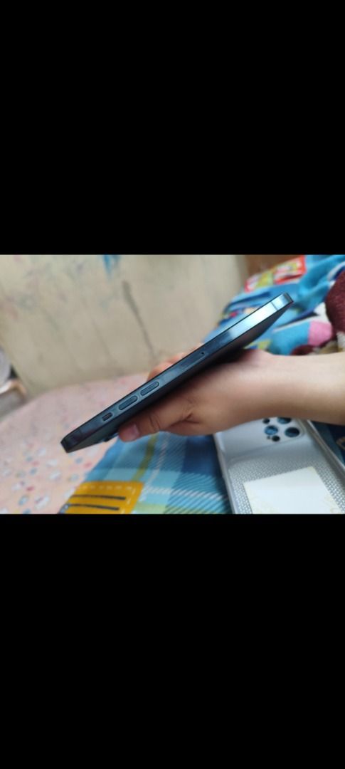 Apple iPhone 12 Pro Max - Pacific Blue (Category: iPhone 12 Series) located in Caloocan City. Submitted by holeeey (Listing ID 1432147464, Image 1). Description: For sale or swap Iphone 12 pro max 256 gb Factory Unlocked Unli Reset All Functions are working Replaced batt and oled Dents (kita sa pic) Unit, case and charger only. Selling (16,500) Swapping (17,500) Sta mesa, Mendiola, Quiapo and Espana meetup only. .