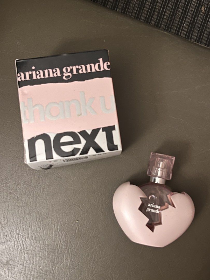 Ariana Grande Thank U Next Eau de Parfum (Category: Fragrance & Deodorants) located in Calamba. Submitted by natalierav (Listing ID 1432107626, Image 2). Description: - Ariana Grande Thank U Next Eau de Parfum - 30ml spray bottle - Unique broken heart bottle design - Comes in a pink box - Features the phrase "thank u next".