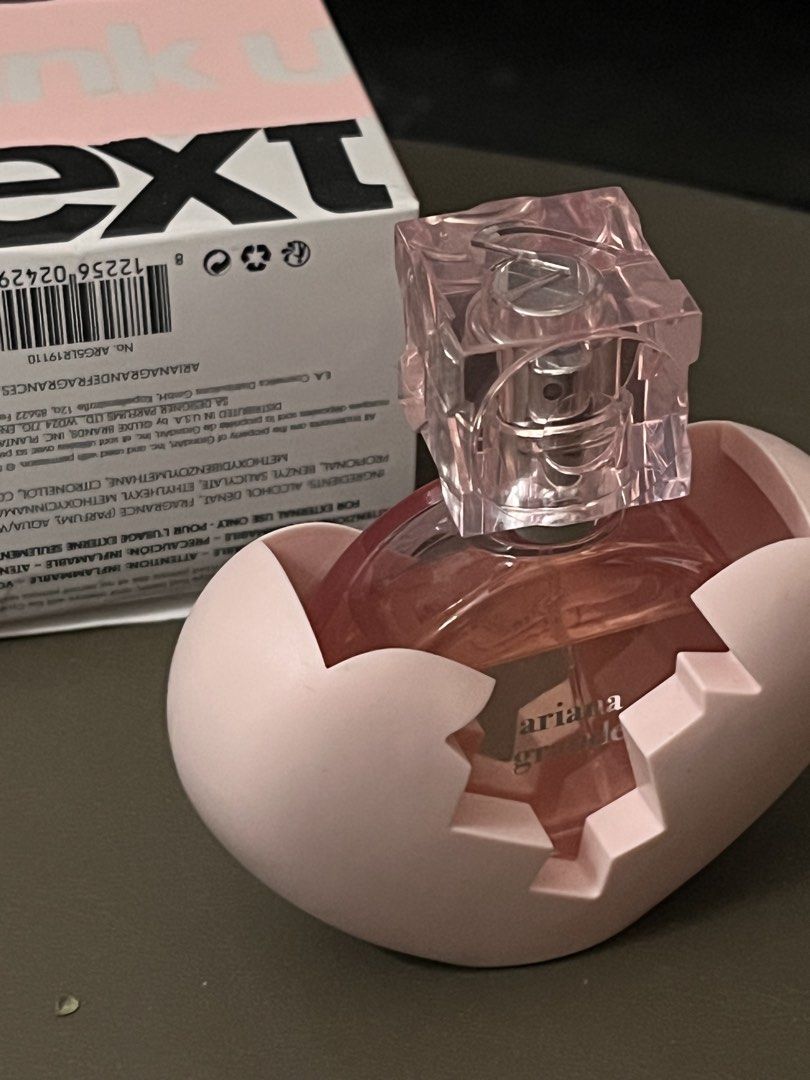 Ariana Grande Thank U Next Eau de Parfum (Category: Fragrance & Deodorants) located in Calamba. Submitted by natalierav (Listing ID 1432107626, Image 3). Description: - Ariana Grande Thank U Next Eau de Parfum - 30ml spray bottle - Unique broken heart bottle design - Comes in a pink box - Features the phrase "thank u next".