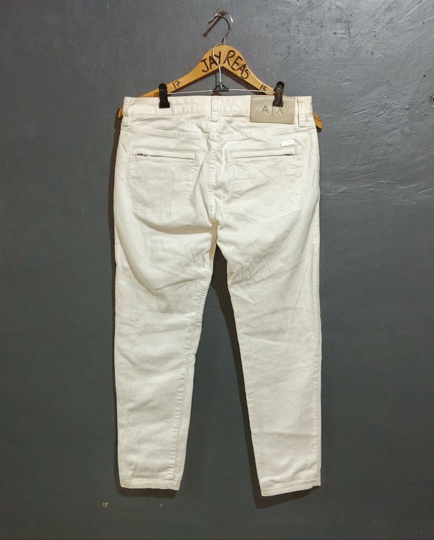 Armani Exchange White Moto Biker Jeans (Category: Luxury Apparel) located in Kananga. Submitted by jayreas1517 (Listing ID 1432148152, Image 2). Description: ∆rmani €xch∆nge legit Biker pants Size: 30 on tag Waistline 32 Length 36 No issue. DM me 📩.