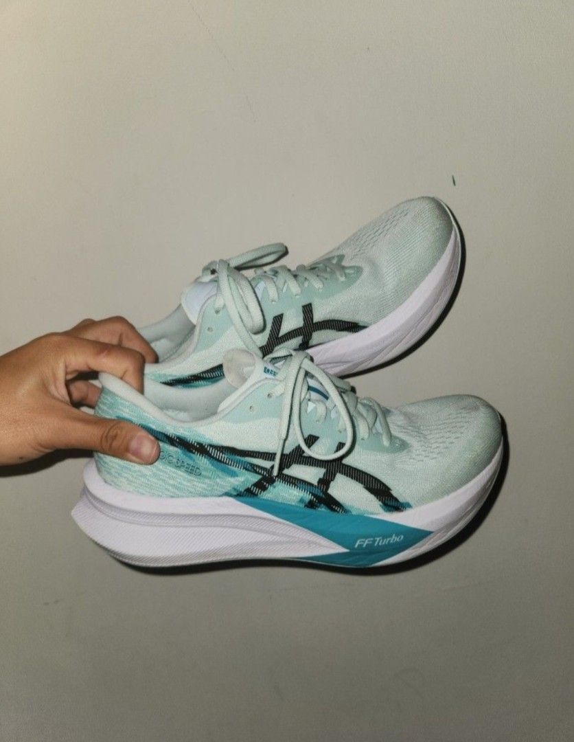 Asics Magic Speed Running Shoes - US 10 (Category: Sneakers) located in Singapore. Submitted by claxxt (Listing ID 1432066784, Image 1). Description: - Asics Magic Speed - Size: US 10 / as per image - Condition: Good, minimal wear - Worn once for 10km, too tight thus selling off..