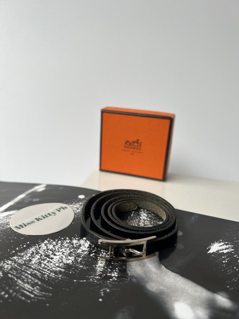 Authentic Preloved Hermes leather bracelet Hapi 4 tour (Category: Luxury Accessories) located in San Pablo. Submitted by misskittyph (Listing ID 1432029042, Image 1). Description: H. E R M E S Black leather Hapi 4 tour bracelet with palladium buckle . ▪️12k only . 9/10 condition With box 3 holes adjustment Reaches up to 4 turns around wrist Layaway options available 💯Guaranteed authentic or your money back .