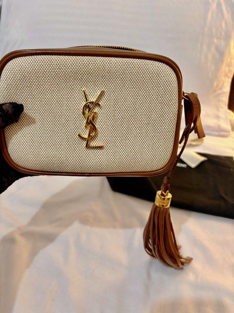 Authentic YSL Lou Belt Bag in canvas monogram (Category: Luxury Bags & Wallets) located in Makati City. Submitted by jabbegailmendoza (Listing ID 1432091064, Image 3). Description: Rank A: very good condition Still brand new Open but never used No sign of usage With dust bag and care card You can make it as crossbody bag using other strap. Can fit iphone promax.