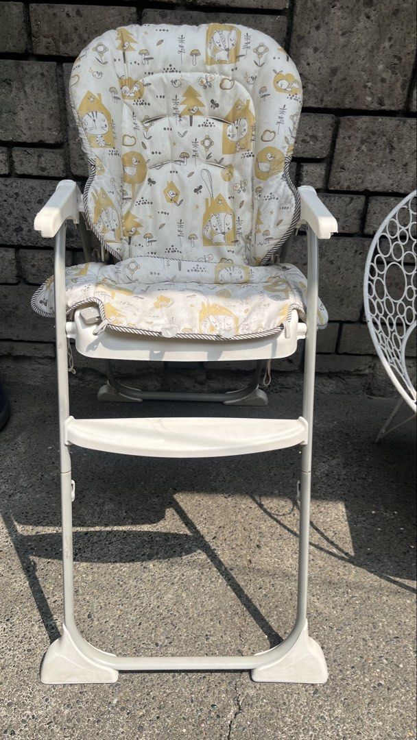 Baby High Chair with table (Category: Baby High Chairs) located in Quezon City. Submitted by _extrapetite_ (Listing ID 1432005195, Image 1). Description: Slightly negotiable Cleaned and disinfected Some stains cannot be removed na, will include our portable seat cover for free Highly chair table will also be included .