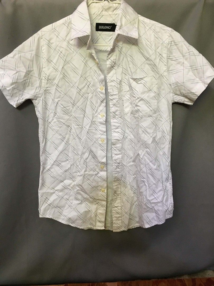 Baleno White Button Down Shirt - Geometric Lines - Size [XS] (Category: Tshirts & Polo Shirts ) located in Bulacan. Submitted by cosmos_thrift (Listing ID 1432117142, Image 1). Description: •Title: Baleno White Button Down Shirt - Geometric Lines - Size [XS] •Description: UNISEX (XS for Men) (S-M for Women) •Price: 350.00 (negotiable) •Payment Methods: Gcash •Delivery options (shoulder by buyer): J&T, Grab, Lalamove, Angkas PLSS MANAGE YOUR EXPEC