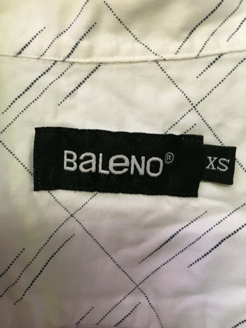 Baleno White Button Down Shirt - Geometric Lines - Size [XS] (Category: Tshirts & Polo Shirts ) located in Bulacan. Submitted by cosmos_thrift (Listing ID 1432117142, Image 2). Description: •Title: Baleno White Button Down Shirt - Geometric Lines - Size [XS] •Description: UNISEX (XS for Men) (S-M for Women) •Price: 350.00 (negotiable) •Payment Methods: Gcash •Delivery options (shoulder by buyer): J&T, Grab, Lalamove, Angkas PLSS MANAGE YOUR EXPEC