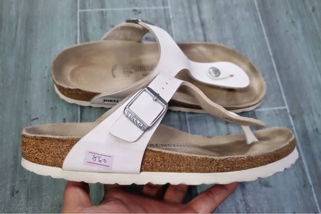 Birkenstock Gizeh White Sandals Size 36 (Category: Flats & Sandals) located in Danao, Cebu. Submitted by altheaprelovedcorner (Listing ID 1432193659, Image 2). Description: - Birkenstock Gizeh sandals - Color: White - Size: 36 - Design: Thong style with buckle closure - Footbed: Cork - Made in Germany - Price: ₱850.