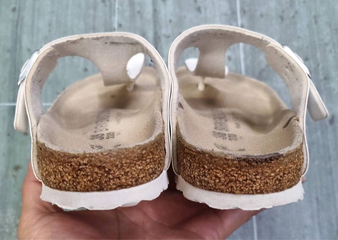 Birkenstock Gizeh White Sandals Size 35 (Category: Flats & Sandals) located in Danao, Cebu. Submitted by altheaprelovedcorner (Listing ID 1432193673, Image 3). Description: - Birkenstock Gizeh sandals - Color: White - Size: 35 - Design: Thong strap - Closure: Buckle - Footbed: Cork - Features Birkenstock logo - Made in Germany.