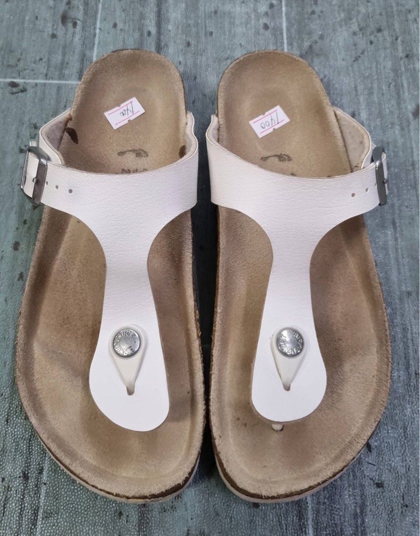 Birkenstock Gizeh White Sandals Size 35 (Category: Flats & Sandals) located in Danao, Cebu. Submitted by altheaprelovedcorner (Listing ID 1432193673, Image 1). Description: - Birkenstock Gizeh sandals - Color: White - Size: 35 - Design: Thong strap - Closure: Buckle - Footbed: Cork - Features Birkenstock logo - Made in Germany.