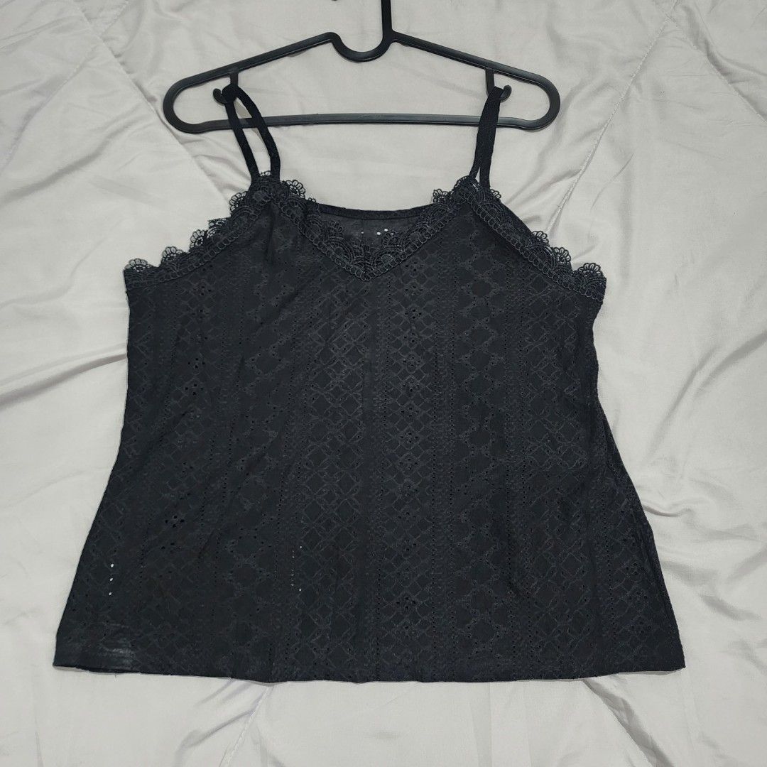 Black Lace Eyelet Tank Top (Category: Sleeveless) located in Makati City. Submitted by depolarize (Listing ID 1432178827, Image 1). Description: - black tank top - lace trim - eyelet details - versatile wardrobe piece - large on tag - washed only.