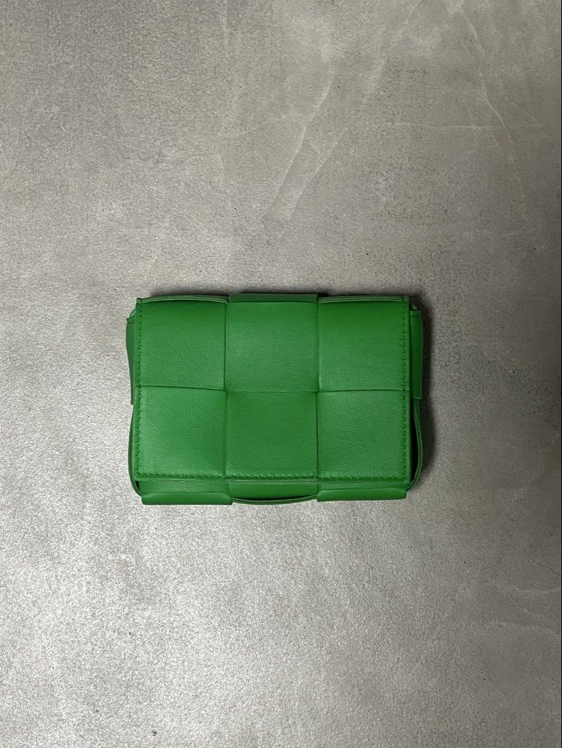 Bottega Veneta Cassette mini bag (Category: Luxury Bags & Wallets) located in Manila. Submitted by shootzoo8231 (Listing ID 1432150749, Image 2). Description: Authentic Bottega Veneta Cassette minibag in green. Features the Intrecciato weave. Includes box and dust bag. Unused..