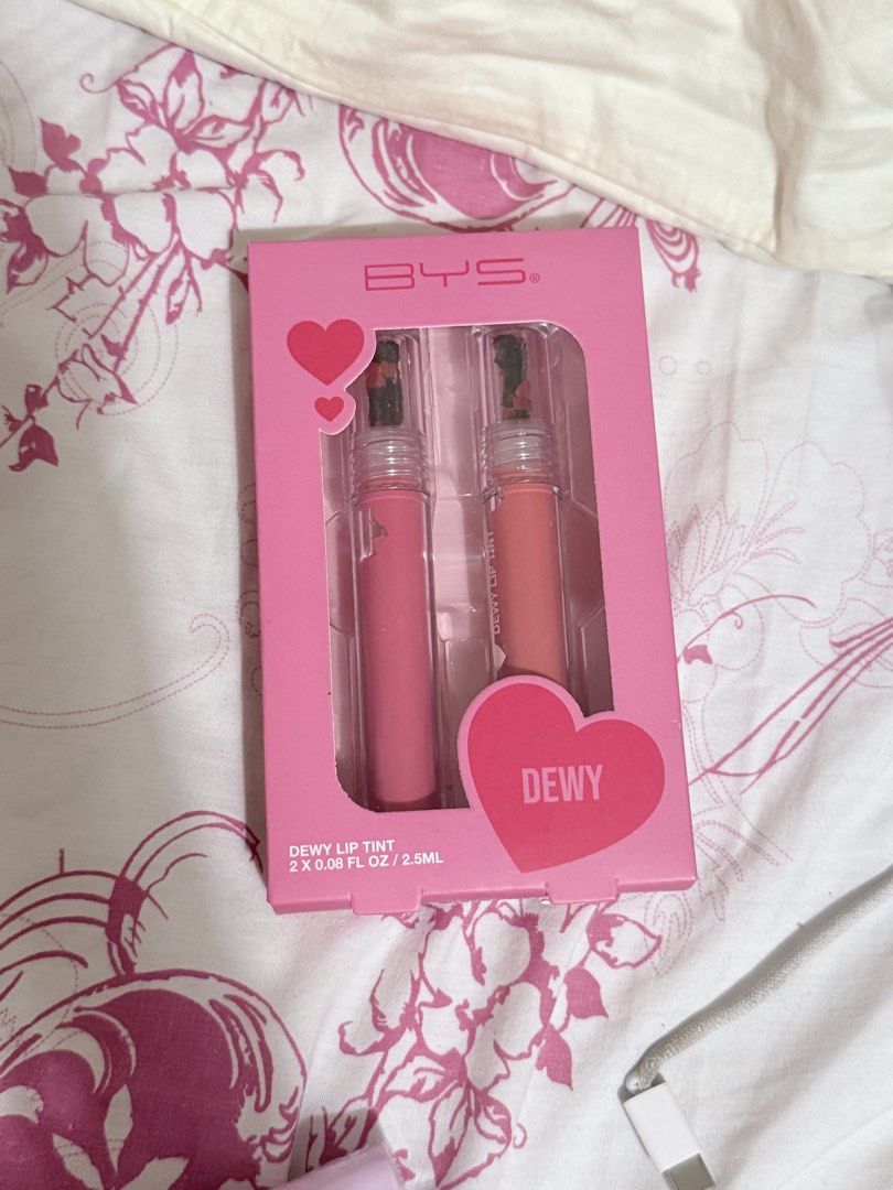 BYS Dewy Lip Tint Set (Category: Makeup) located in Manila. Submitted by alishabianca (Listing ID 1432186767, Image 1). Description: - BYS Dewy Lip Tint Set - Includes two pink lip tints - Each tint: 2.5ml - New and sealed - Pink packaging with heart design - 'Dewy' printed on packaging .