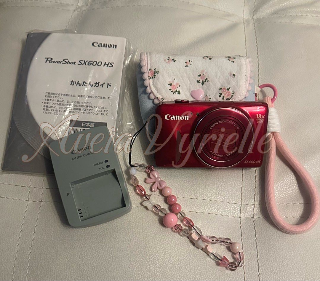 Canon SX600 HS Digital Camera (Category: Cameras) located in Paranaque City. Submitted by vyrielleaveia (Listing ID 1431027373, Image 1). Description: FIXED PRICE ! NO LOWBALLERS condi 8/10 with few dents and little scratches no functional issues - with pop up flash - hybrid / live photo - with screen protector - built in wifi inclu: - unit - battery - cute case - strap - manual - battery charger.