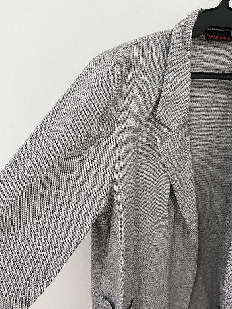 Casablanca Gray Blazer (Category: Coats, Jackets and Outerwear) located in Cavite. Submitted by letsgosab (Listing ID 1432195604, Image 2). Description: - Casablanca gray blazer - Classic design - Notched lapel - Two front pockets - Single-button closure - Long sleeves - Tailored fit - Casablanca logo visible - Subtle textured pattern.