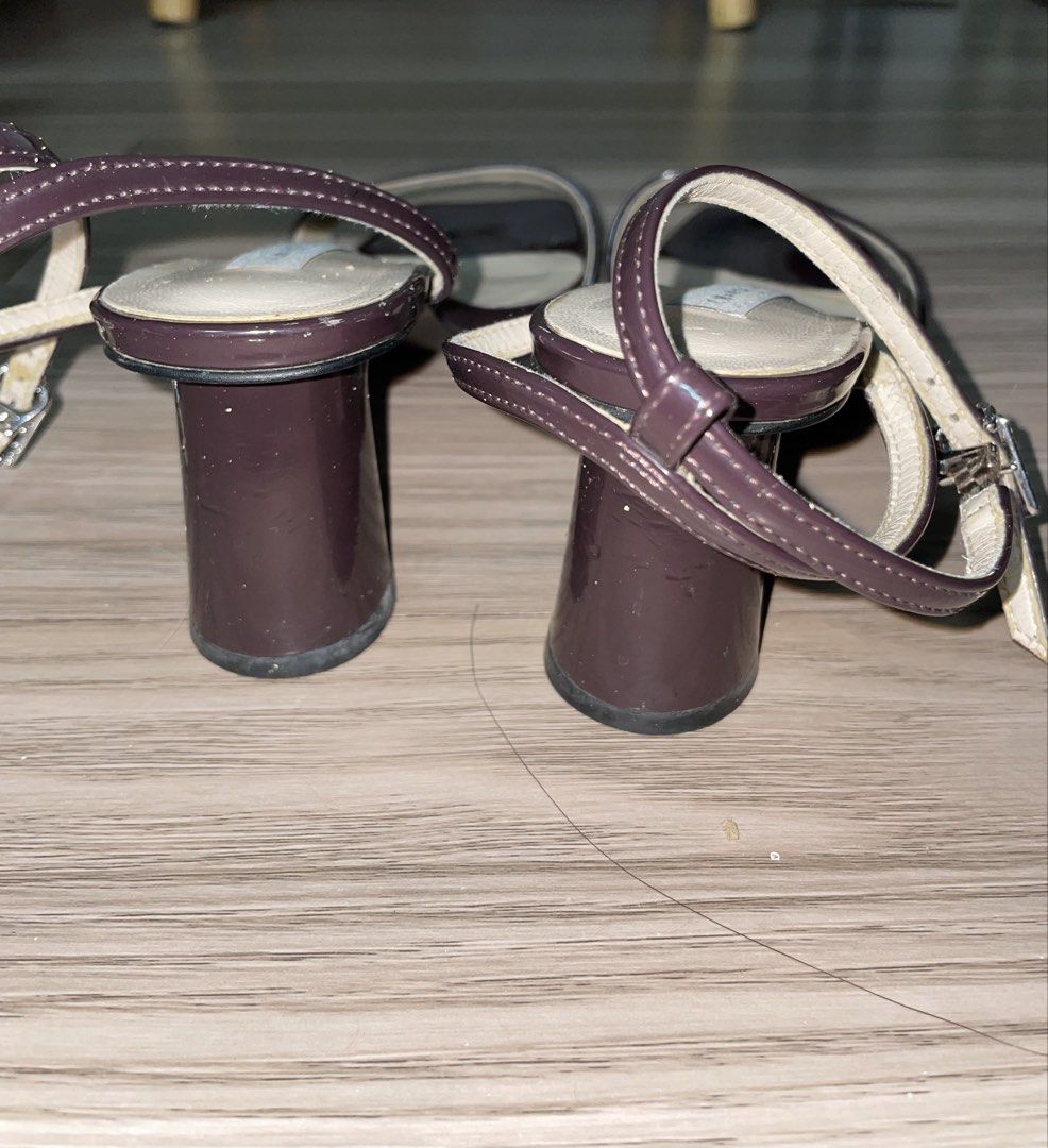 Charles & Keith Sandals (Category: Heels) located in Marikina City. Submitted by declutter_2026 (Listing ID 1432116766, Image 3). Description: - Style: Strappy open-toe heels - Color: Dark brown / maroon - Heel: Mid block heel 2.5inches - Issue: the insole is peeling/chipping, which is common when stored or exposed to heat/moisture but not visible when in use.
