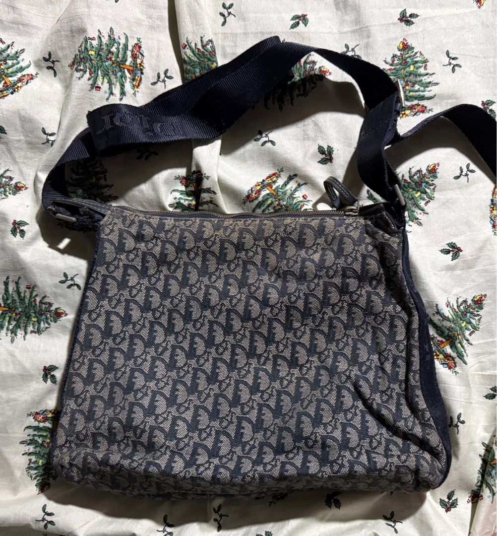 Christian Dior Oblique Shoulder Bag (Category: Luxury Bags & Wallets) located in Taytay. Submitted by jayezapanta (Listing ID 1432192204, Image 1). Description: - Christian Dior shoulder bag - Iconic Oblique pattern - Navy blue adjustable strap with Dior branding - Zip closure with gold-tone zipper and Dior charm - Interior includes Christian Dior Paris label No code Needs cleaning Pls self authenticate.
