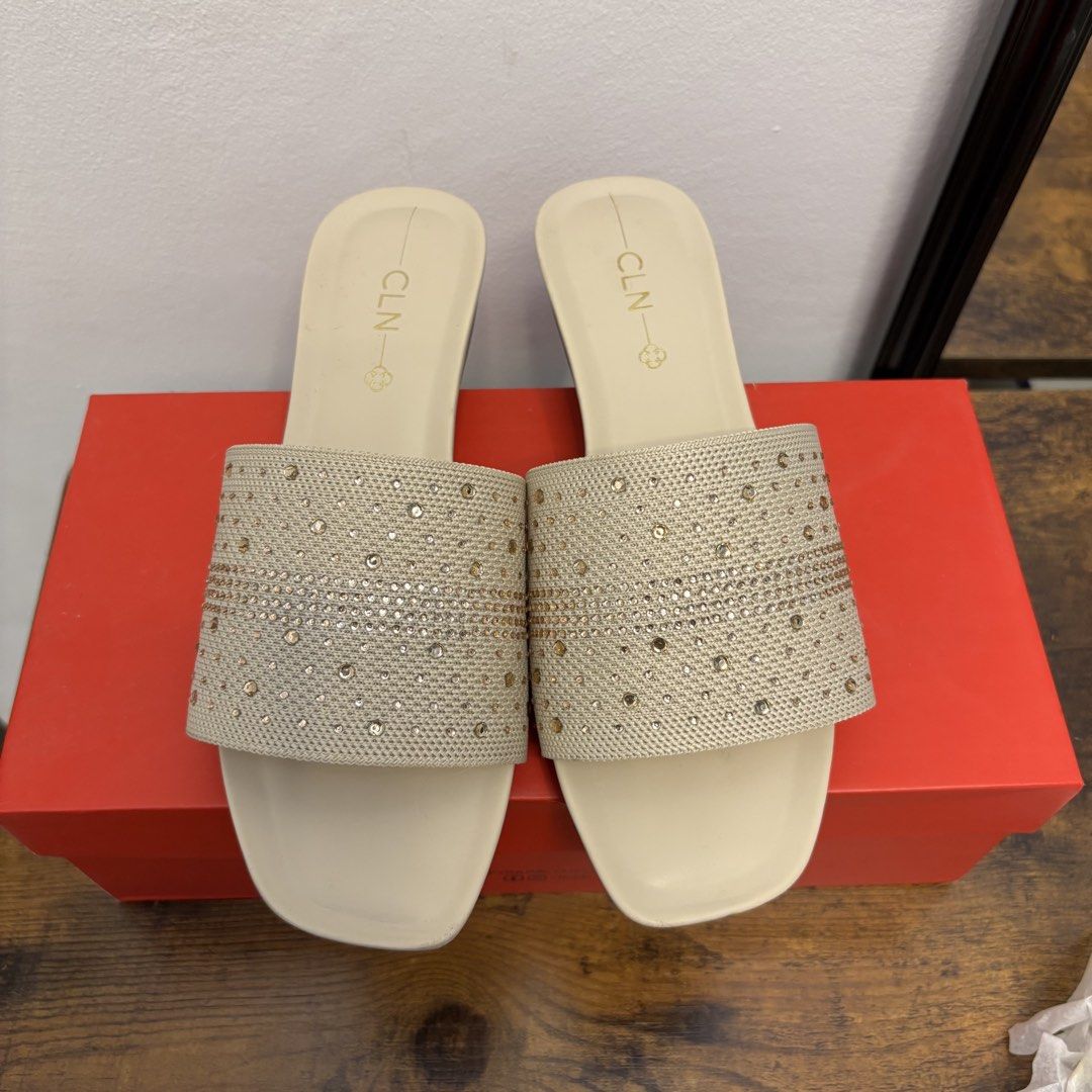 CLN Sofia Beige Sandals | Wedge Sandals |Flats (Category: Flats & Sandals) located in Cavite. Submitted by Cheapips (Listing ID 1432076790, Image 1). Description: 💯 ORIGINAL CLN - Used once (wedding event) - In perfect condition - CLN Sofia sandals - Beige color - Size 36 - Woven strap with decorative studs - Wedge heel - Square toe design - Includes original box NO DAMAGES.
