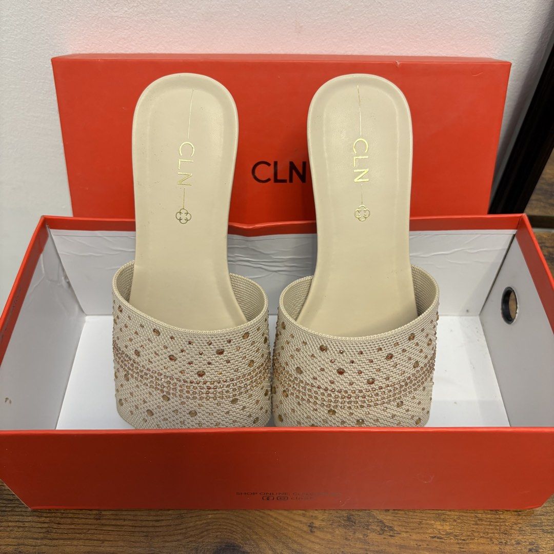 CLN Sofia Beige Sandals | Wedge Sandals |Flats (Category: Flats & Sandals) located in Cavite. Submitted by Cheapips (Listing ID 1432076790, Image 2). Description: 💯 ORIGINAL CLN - Used once (wedding event) - In perfect condition - CLN Sofia sandals - Beige color - Size 36 - Woven strap with decorative studs - Wedge heel - Square toe design - Includes original box NO DAMAGES.