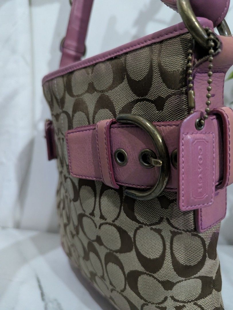 Coach Pink Vintage Shoulder/sling Bag (Category: Luxury Bags & Wallets) located in Rizal. Submitted by asismichel69225 (Listing ID 1432179730, Image 2). Description: - Coach shoulder bag - Pink leather accents - Signature monogram pattern - Pink leather base and straps - Decorative buckles - Gold-toned hardware - Shoulder strap - Top zipper closure.