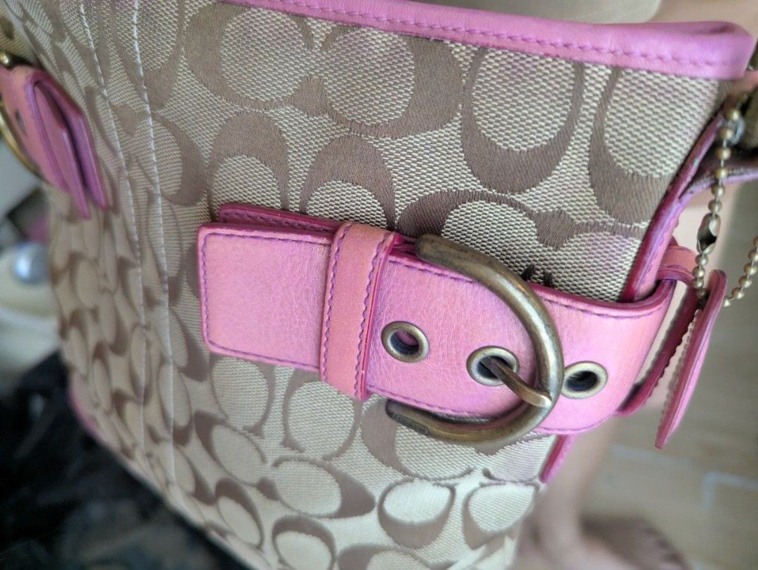 Coach Pink Vintage Shoulder/sling Bag (Category: Luxury Bags & Wallets) located in Rizal. Submitted by asismichel69225 (Listing ID 1432179730, Image 3). Description: - Coach shoulder bag - Pink leather accents - Signature monogram pattern - Pink leather base and straps - Decorative buckles - Gold-toned hardware - Shoulder strap - Top zipper closure.