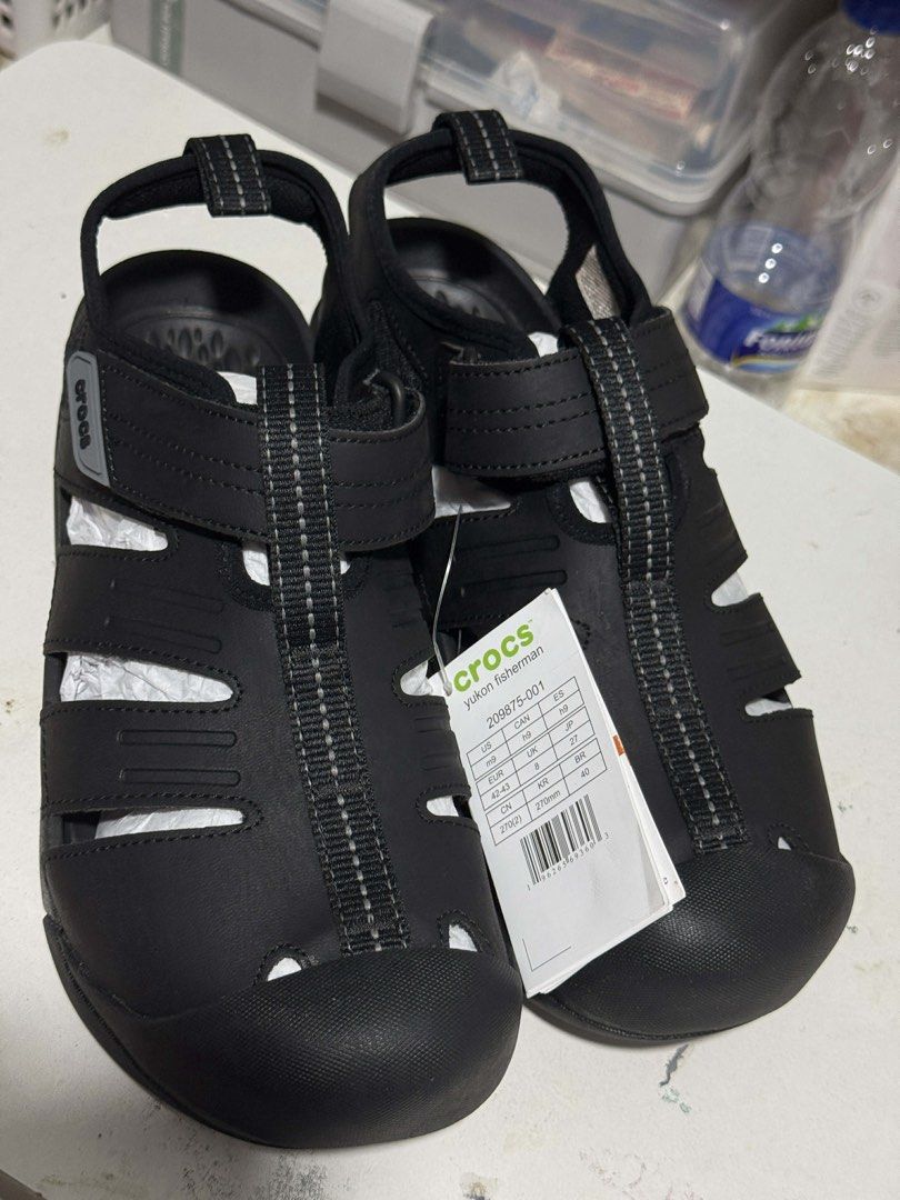 Crocs Yukon Fisherman Sandals (Category: Slippers & Slides) located in Taguig. Submitted by maeeeee111 (Listing ID 1432095764, Image 2). Description: - Black Crocs Yukon Fisherman sandals - US Men's Size 9 - Adjustable straps - Closed-toe design - Features Crocs logo - Includes original tag.